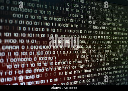 red binary code background. computer problems concept. black background. malware virus data transfer. Stock Photo