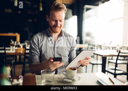 Businessman constantly working Stock Photo