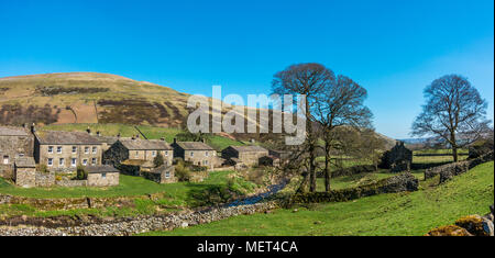 The picturesque stone houses of the village of Thwaite on a beautiful day, Yorkshire Dales, UK Stock Photo