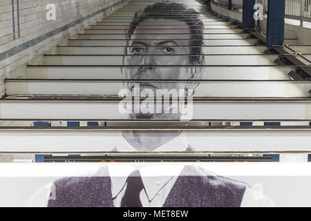 New York, USA. 121 April, 2018. Image of David Bowie across the beams of the the Broadway-Lafayette subway station.  The installation, sponsorsed  by Spotify, is being held in conjunction with the exhibition 'David Bowie IS' at the Brooklyn. The subway installation is just blocks from where the late rock star lived in Soho. The art will be on display until mid May. ©Stacy Walsh Rosenstock Stock Photo