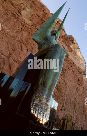 One of two bronze Winged Figures of the Republic statues adorns the Hoover Dam. Stock Photo