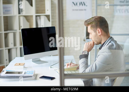 Writing down Creative Ideas Stock Photo