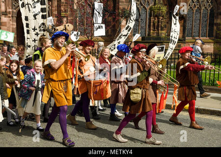 Chester, UK. 23rd April 2018. Musicians lead the St George's Day parade through Chester city centre. The parade includes street performance, theatre and music with local school children performing many supporting roles. Credit: Andrew Paterson/Alamy Live News Stock Photo