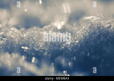 Close up of frost crystals growing on snow Stock Photo