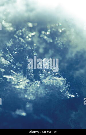 Close up of frost crystals growing on snow Stock Photo