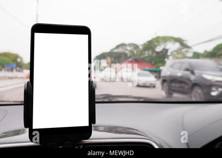 Use your smartphone in car to get GPS directions to your destination through the village. Smartphone is blank Stock Photo