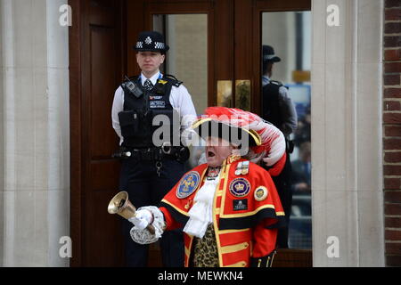 A town crier outside the Lindo Wing at St Mary's Hospital in Paddington, London, after the news that the Duchess of Cambridge has given birth to a son. Stock Photo