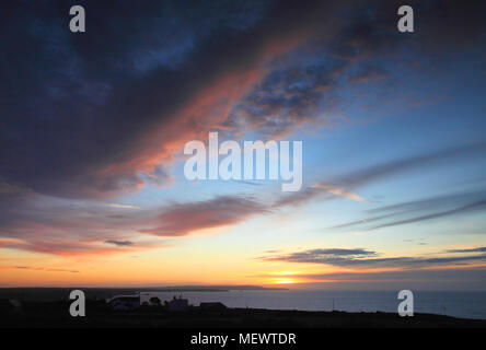 The autumn sun has just set over the north Cornwall coast at St Agnes. Stock Photo