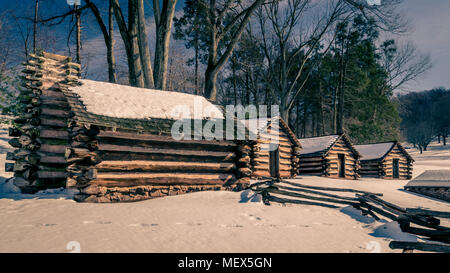 Winter Log Cabins In The Snow In Norway Surrounded By A Frosty