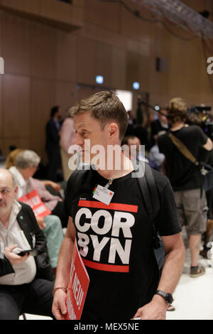 Wiesbaden, Germany. 22nd Apr, 2018. A delegate wears a t-shirt supporting Jeremy Corbyn, the leader of the British Labour party. Andrea Nahles, the leader of the parliamentary party of the SPD in the Bundestag (German Parliament) has been elected as the new chairwoman of the SPD (Social Democratic Party of Germany). She won with 66% against her opponent Simone Lange in a contested election. She is the first women to lead the party in its 150 year long history. Credit: Michael Debets/Pacific Press/Alamy Live News Stock Photo