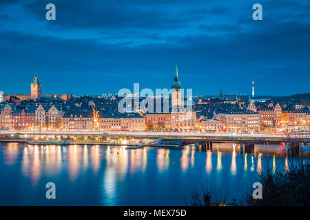 Panoramic view of famous Stockholm city center with historic Gamla Stan old town district during blue hour at dusk, Sodermalm, Stockholm, Sweden Stock Photo