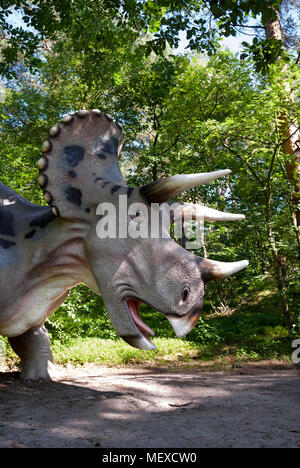 Sculpture of dinosaur (triceratops) in live size. Stock Photo