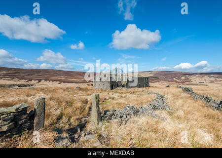 A derelict abandoned and Edwardian farmhouse on the moorland of Calderdale in West Yorkshire Stock Photo