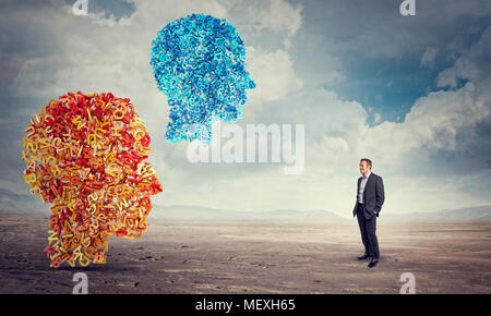 businessman and abstract letters and numbers human head in the desert Stock Photo