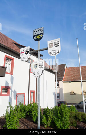 Sign of twin towns at the church square in Weisenheim am Berg, Rheinland-Pfalz, Germany, Europe Stock Photo