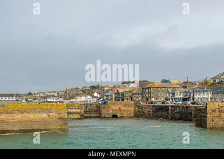 Porthleven Harbour and Porthleven behind, South West Cornwall Stock Photo