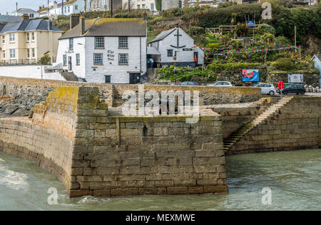 The Ship Inn and Harbour Wall at Porthleven, Cornwall, West of England Stock Photo