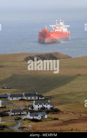 Oil Tanker anchored off the coast of Shetland waiting for orders Stock Photo