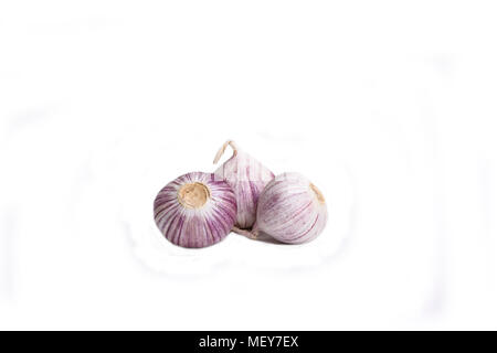Three garlic bulbs isolated on white background Stock Photo