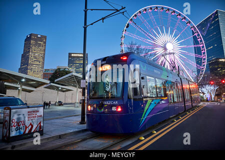 Atlanta capital of the U.S. state of Georgia, Atlanta Streetcar sometimes known as the downtown loop with the Skyview Atlanta ferris wheel Stock Photo