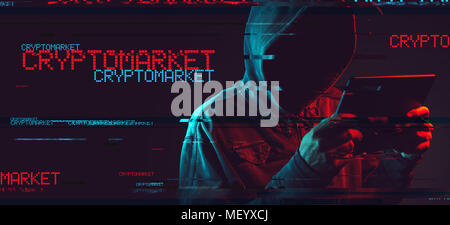 Cryptomarket scam concept with faceless hooded male person using tablet computer, low key red and blue lit image and digital glitch effect Stock Photo