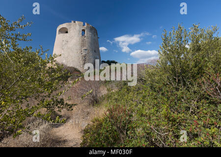 The vegetation of inland surrounds the tower Cala Pira Castiadas Cagliari Sardinia Italy Europe Stock Photo