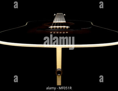 Acoustic Guitar from below Stock Photo