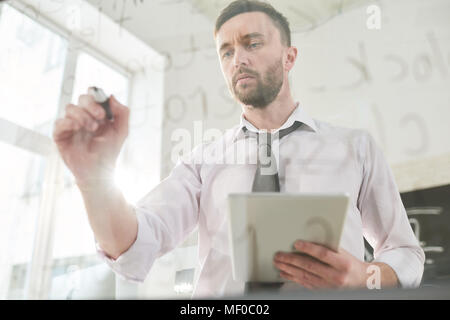 Coding specialist concentrated on work Stock Photo