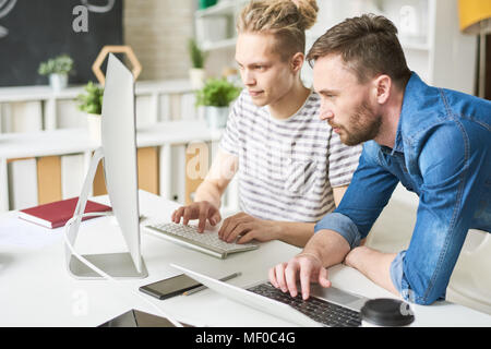 Software engineers working together Stock Photo