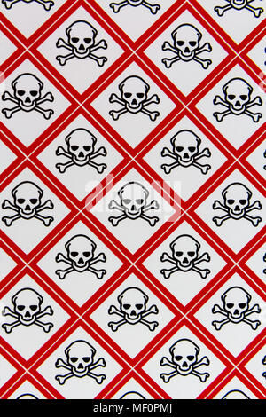 A sheet of the CLP Regulation/GHS chemical warning labels for Acute toxicity (Symbol: Skull and crossbones materials. Stock Photo