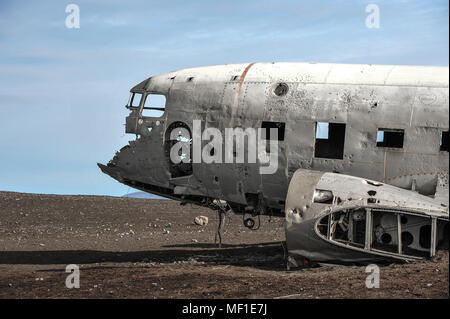 Twisted wreckage of abandoned US military plane sits on Solheimasandur black sand beach, near Vik, southern Iceland Stock Photo