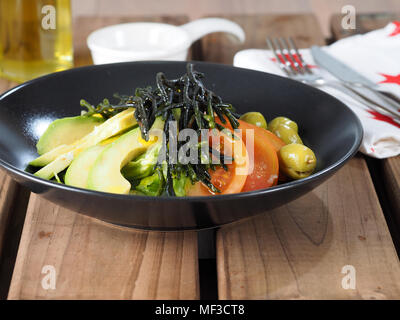 Codium – Velvet horn – Spongeweed in Salad with avocado.  Edible green seaweed in the family Codiaceae. Binomial name: Codium tomentosum. There are ab Stock Photo