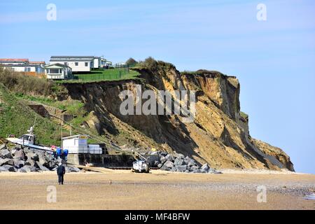 Holiday caravans close to the cliff edge East Runton Cromer Norfolk England UK Stock Photo