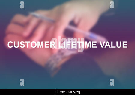 Customer lifetime value word with blurring business background Stock Photo