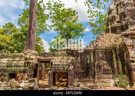 Interesting view of the inner wall and part of the corner tower of the Banteay Kdei temple in Angkor, Cambodia. Stock Photo