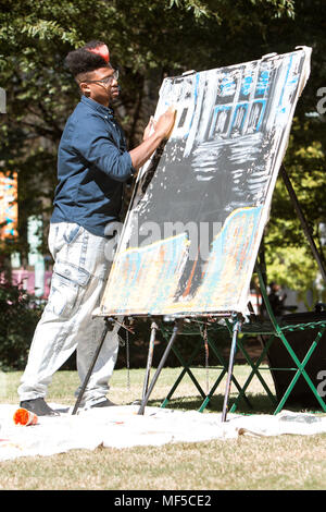 African american artist man painting ceramic at art studio Stock Photo ...