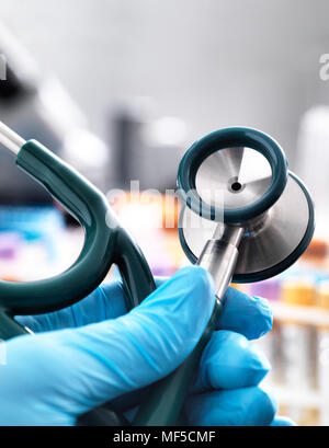 Doctor holding a stethoscope Stock Photo