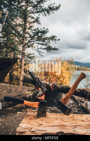 Canada, British Columbia, Boya Lake, chopping wood Stock Photo