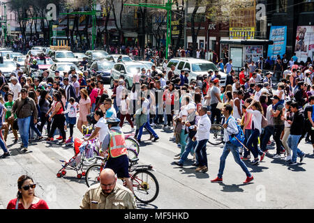 Mexico City,Mexican,Hispanic,historic Center Centre,Eje Central Lazaro Cardena,busy major intersection,crowded pedestrians street crossing,man men mal Stock Photo