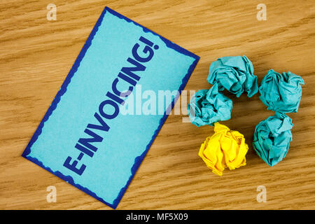 Word writing text E-Invoicing Motivational Call. Business concept for Company encourages use of digital billing written Sticky Note paper wooden backg Stock Photo
