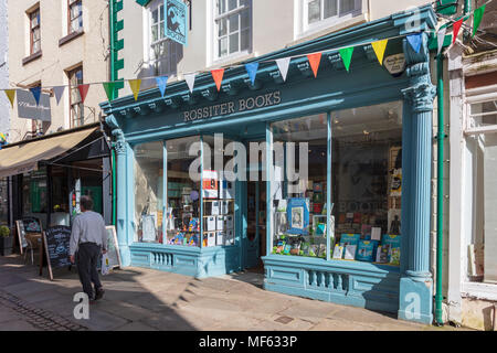 Shops on the attractive Church Street, a paved shopping area in Monmouth, Monmouthshire, Wales, UK. Rossiter Books is a typical example of a traditional shop. Stock Photo