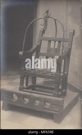 Postcard real photo of an ancient ducking stool Stock Photo