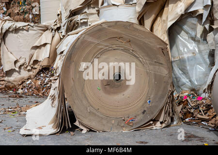 Paper spools.  Waste paper in the yard.  Paper recycling. Stock Photo