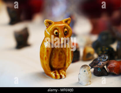 Selective focus of ceramic figurines of small owl Stock Photo