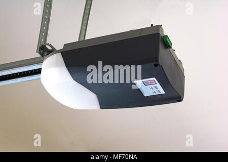 Close-up of an automatic garage door opener motor. Stock Photo