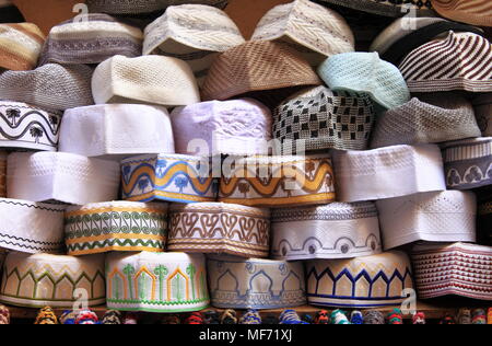 Traditional Moroccan hats on display in Fes medina, Morocco Stock Photo