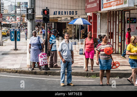 Panama City, Panama - march 2018: People standing at traffic light on busy shopping street in Panama City , Avenida Central Stock Photo