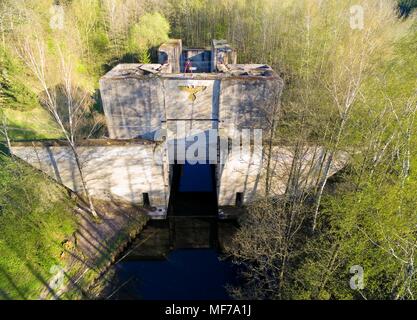 Giant unfinished concrete lock in Lesniewo Gorne - part of the Masurian Canal which was intended to connect the Great Masurian Lakes with the Baltic s Stock Photo