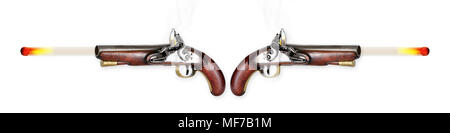 Two antique flintlock pistols firing musketballs. Stock Photo