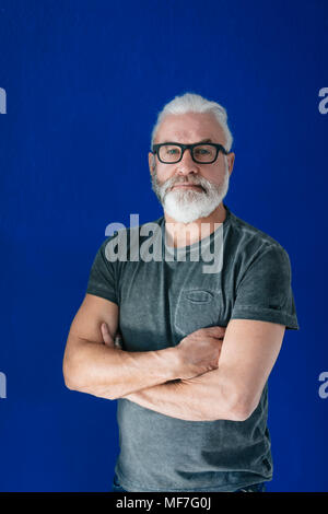 Portrait of confident bearded mature man Stock Photo